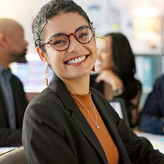 A female employee smiling.