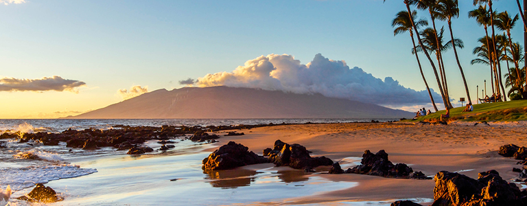 A view of the sunset along the coast.