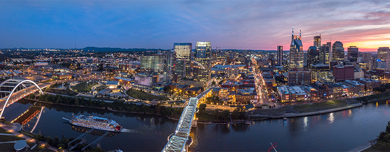 A nighttime landscape of downtown Nashville.